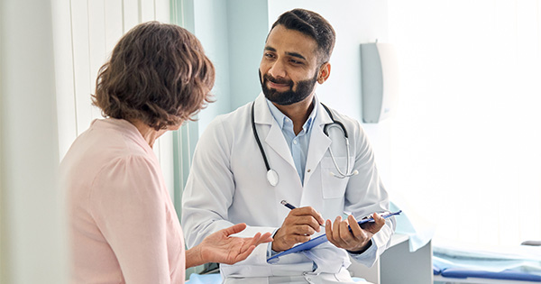 Provider talking with patient.